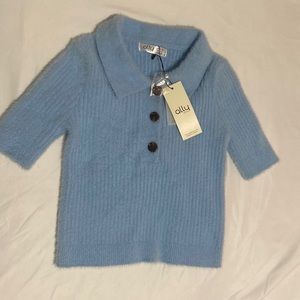 Im selling this top because I had it for years and never wore it.